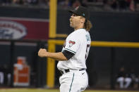 Arizona Diamondbacks pitcher Andrew Chafin reacts after striking out Colorado Rockies' Elehuris Montero for the last out in the ninth inning of a baseball game Monday, May 29, 2023, in Phoenix. (AP Photo/Darryl Webb)