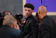 Jun 22, 2017; Brooklyn, NY, USA; Lonzo Ball (UCLA) celebrates with his father LaVar Ball after being introduced as the number two overall pick to the Los Angeles Lakers in the first round of the 2017 NBA Draft at Barclays Center. Mandatory Credit: Brad Penner-USA TODAY Sports