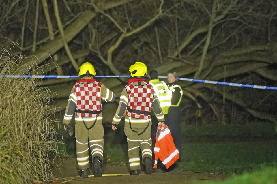 Emergency personnel at the scene in Babbs Mill Park in Kingshurst, Solihull after a serious incident where several people are believed to be in a critical condition after being pulled from the lake. Picture date: Sunday December 11, 2022.