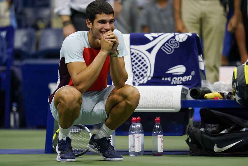 Carlos Alcaraz, of Spain, reacts after defeating Frances Tiafoe, of the United States, during the semifinals of the U.S. Open tennis championships, Saturday, Sept. 10, 2022, in New York. (AP Photo/Charles Krupa)