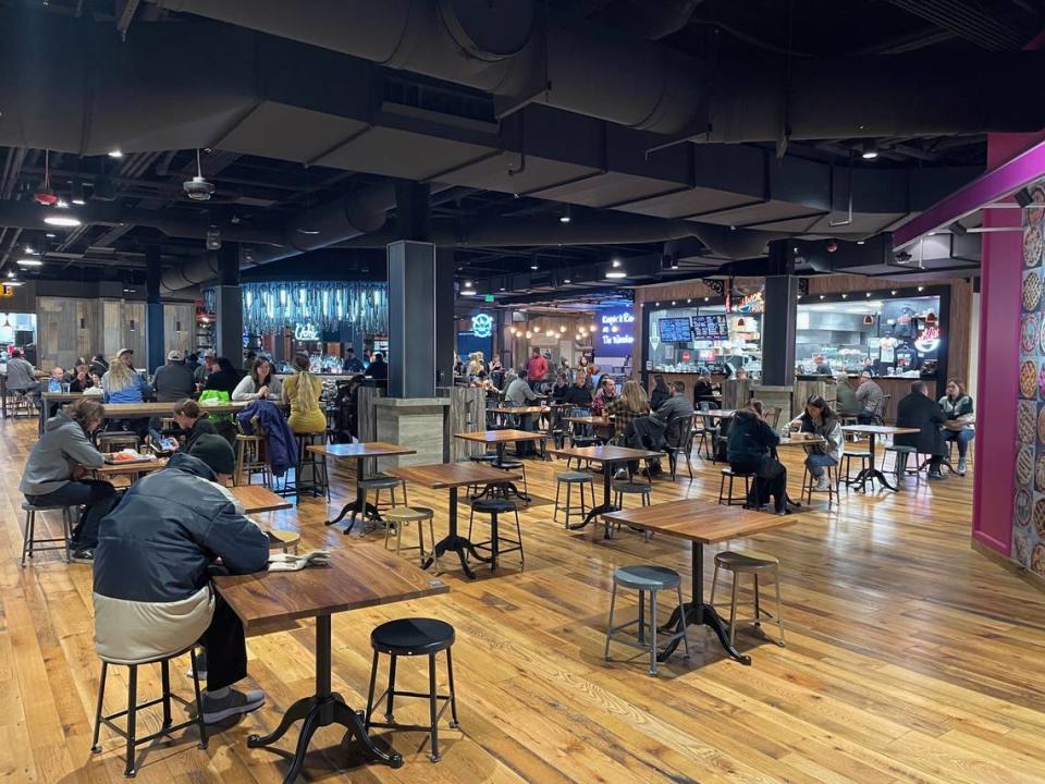 Diners enjoy a lively atmosphere on a weeknight recently at The Warehouse Food Hall in downtown Boise.