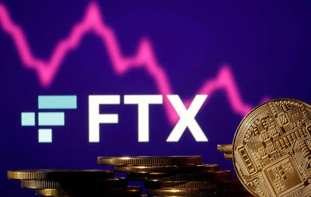 PHOTO: FILE - Representations of cryptocurrencies are seen in front of displayed FTX logo and decreasing stock graph in this illustration taken Nov. 10, 2022. (Dado Ruvic/Reuters, FILE)