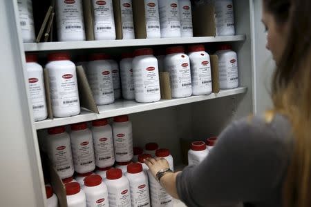 An employee arranges medical supplies at the headquarters of the medical products supplier Paul Arnaoutis S.A company in Athens June 9, 2015. REUTERS/Alkis Konstantinidis