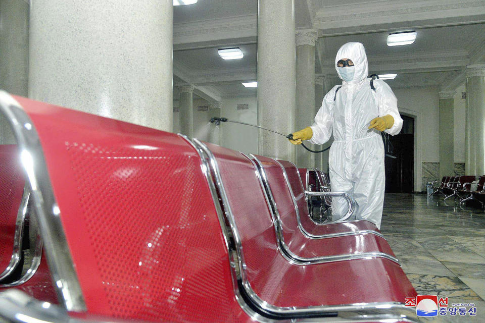 In this undated photo provided on Saturday, Aug. 29, 2020, by the North Korean government, an employee disinfects the inside of Pyongyang Station to protect against the coronavirus in Pyongyang, North Korea. Independent journalists were not given access to cover the event depicted in this image distributed by the North Korean government. The content of this image is as provided and cannot be independently verified. Korean language watermark on image as provided by source reads: "KCNA" which is the abbreviation for Korean Central News Agency. (Korean Central News Agency/Korea News Service via AP)