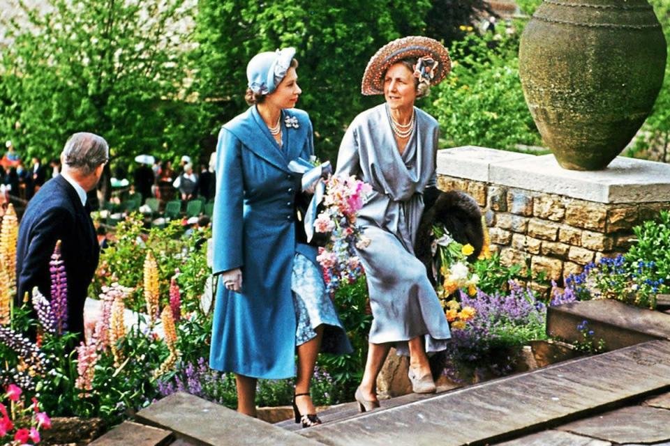 Politician and tennis player Lady Domini Crosfield (right) goes into tea with Princess Elizabeth in Highgate, London, 1951 (Getty Images)