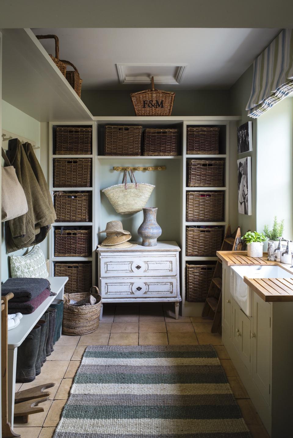 <p> Having a dedicated space to store boots, rainwear, dog leads and all the other bits and bobs you need for venturing into the great outdoors is ideal in a country home. </p> <p> Built-in cabinetry for storage, a bench for pulling off gum boots and hooks for coats are prerequisites. If space and plumbing allows, install a sink for easy clean-ups, dog washing, flower prep and cleaning the mud from homegrown veggies. </p> <p> Practical flooring such as stone or tile will mean dirt can be swept and mopped away – add a washable rug for a touch of softness. </p> <p> It's the details that will take your mud room from a space you want to keep hidden, to one that's a fully integrated – and stylish – part of your home. Country decorating ideas can include woven baskets for your kit and clobber, a fabric blind for a touch of colour and pattern, plus pictures and plants for personality. </p> <p> When you don't have the space for a standalone mud room, integrate its essential elements into a hallway. Here, hooks, seating, boot storage and practical flooring all feature, without cluttering the narrow space. </p>