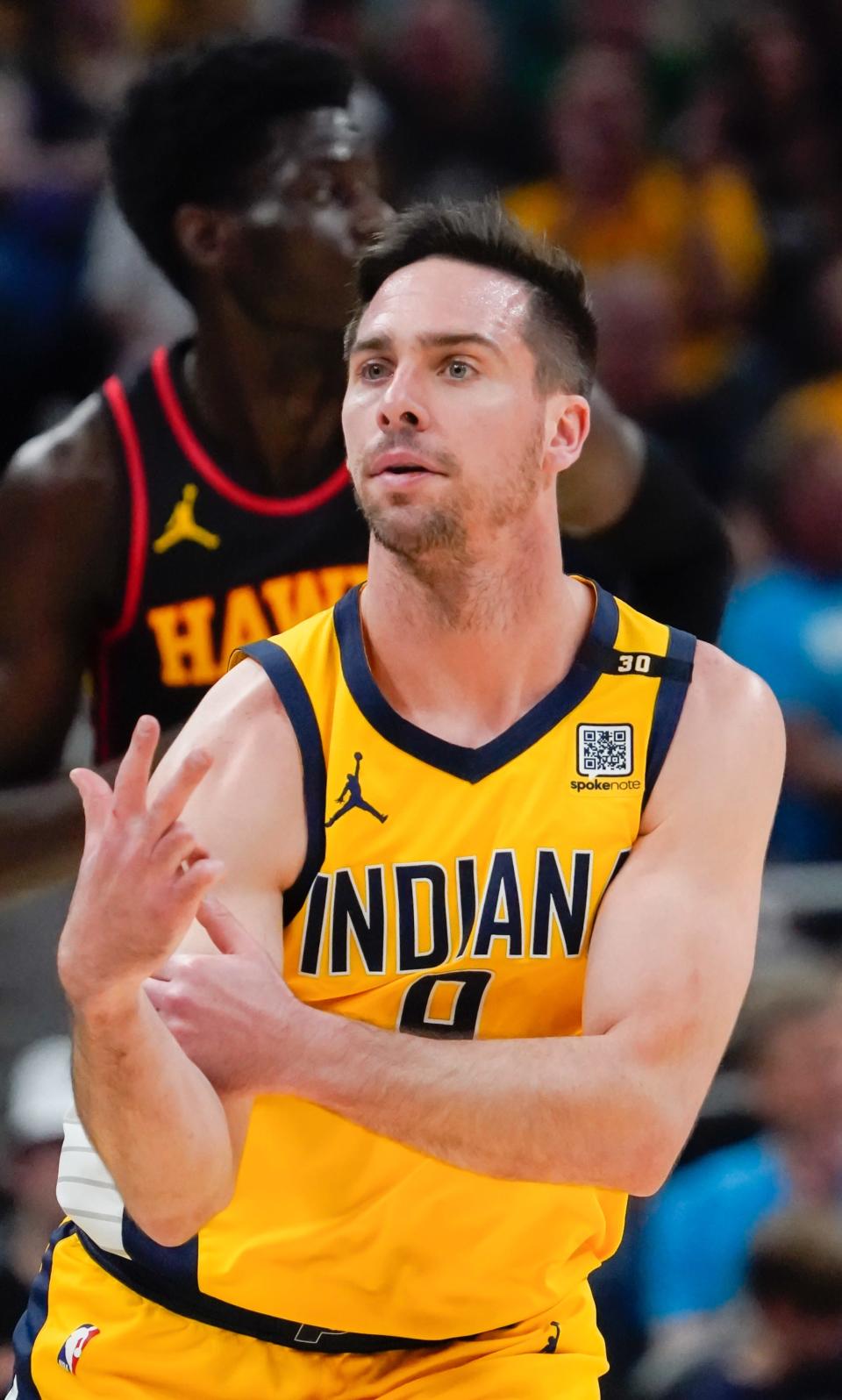 Indiana Pacers guard T.J. McConnell (9) reacts to his basket during a game between the Indiana Paces and the Atlanta Hawks on Sunday, April 14, 2024, at Grainbridge Fieldhouse in Indianapolis.
