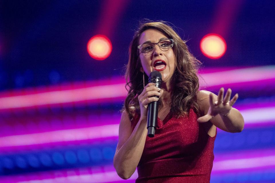 Rep. Lauren Boebert, R-Col., speaks during the third day of AmericaFest 2021 hosted by Turning Point USA on Dec. 19, 2021, in Phoenix. She will speak at the Knox County Republican Party's annual Lincoln Day Dinner on Oct. 19.