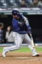 Tampa Bay Rays designated hitter Harold Ramirez hits a two-run double off Cleveland Guardians relief pitcher Trevor Stephan during the 11th inning of a baseball game, Tuesday, Sept. 27, 2022, in Cleveland. (AP Photo/Ron Schwane)