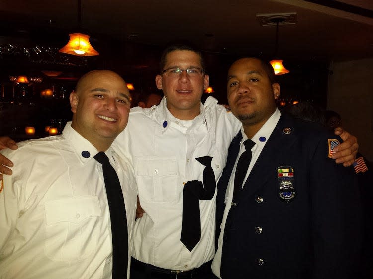 Spring Valley Columbian firefighters, left to right,  Avi Guneth, Eric Cich, and Jared Lloyd
