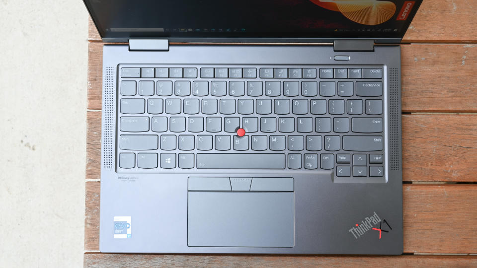 Lenovo ThinkPad X1 Yoga (Gen 6) keyboard viewed from above on an outdoor table