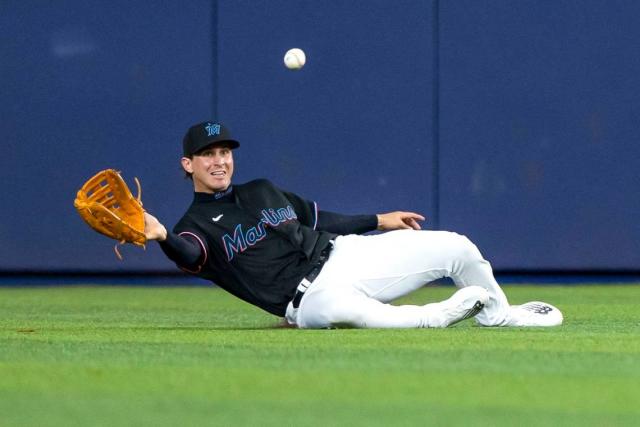 Miami Marlins outfielders JJ Bleday, left to right, Peyton Burdick
