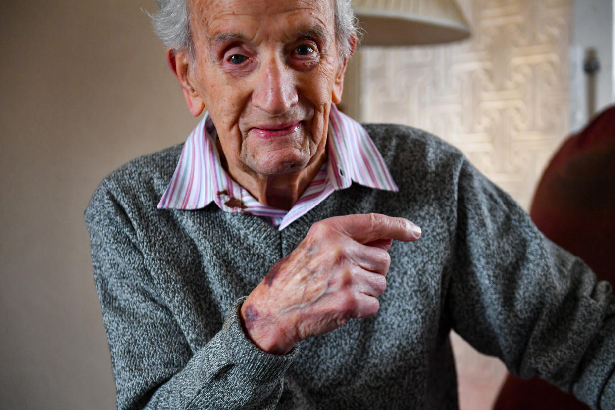 John Cox, 102, at his home in Lincoln, where he fought off a conman burglar who tried to gain access on Tuesday.