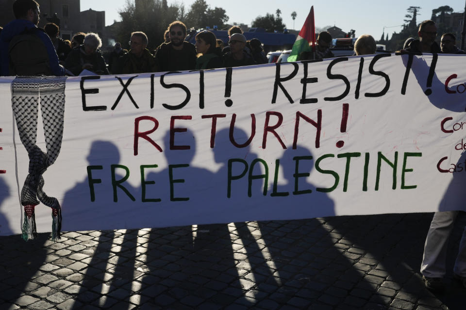 Protesters gather during a rally in support of the Palestinians in Rome, Saturday, Jan. 13, 2024. (AP Photo/Gregorio Borgia)