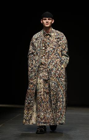 A model presents a creation from the Craig Green MAN Autumn/Winter 2014 collection during "London Collections: Men" in London January 6, 2014. REUTERS/Suzanne Plunkett