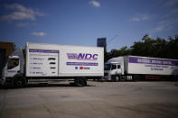 A learner truck driver sits in the cab of a training truck at the National Driving Centre in Croydon, south London, Wednesday, Sept. 22, 2021. Britain doesn't have enough truck drivers. The shortage is contributing to scarcity of everything from McDonald's milkshakes to supermarket produce. (AP Photo/Matt Dunham)