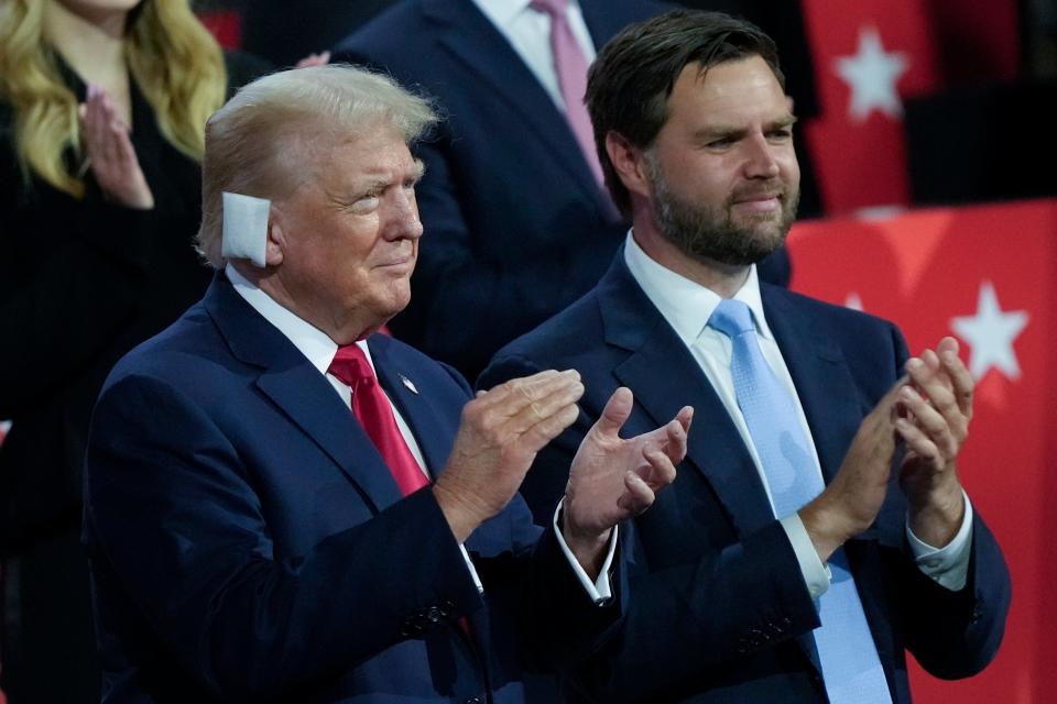 Donald Trump stands next to his running mate JD Vance at the Republican National Convention (AP)