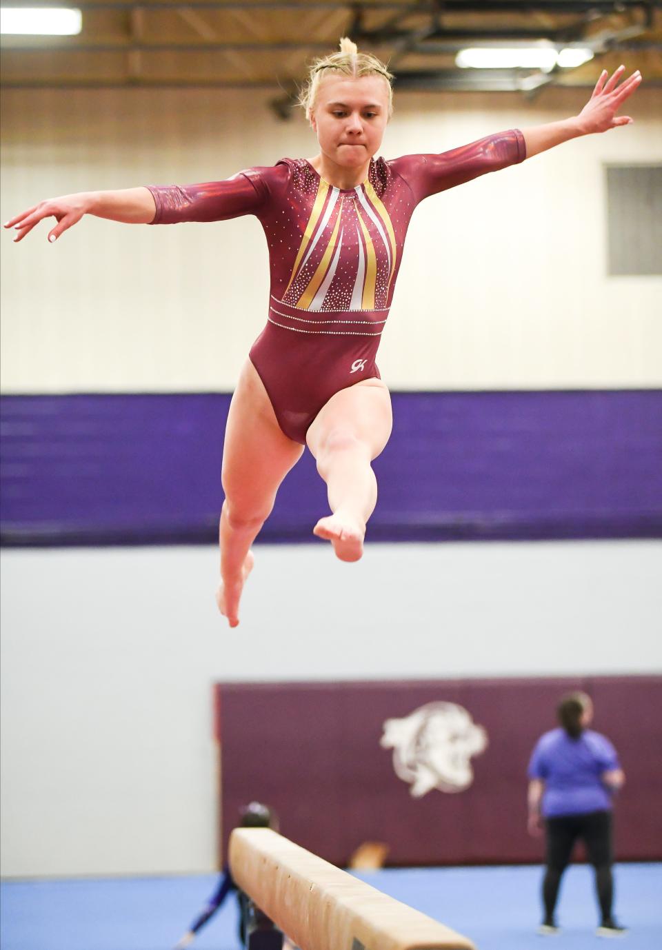 Bloomington North’s Sofie Garcia competes on the beam during the gymnastics meet against Bloomington South and Edgewood at South on Monday, Jan. 8, 2024.