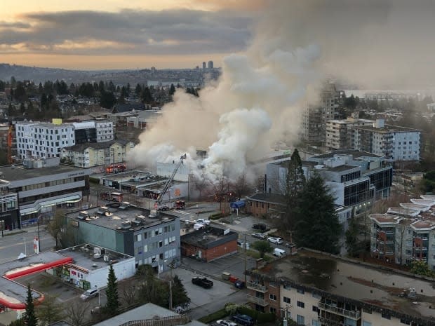 North Vancouver fire crews responded to a fire near Lonsdale Avenue and 12th Street on Tuesday morning, one of three fires at Masonic lodges in the metro Vancouver area. Police later said they had arrested a 42-year-old man in connection with the fire. (Submitted by Carol Reimer - image credit)