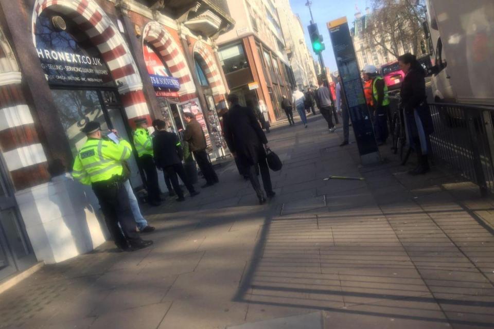 Investigation: Police at the scene in Piccadilly (Tom Powell)