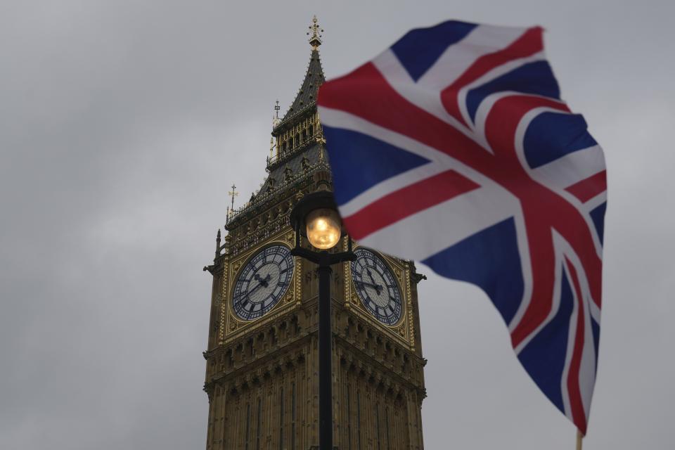 FILE - A Union flag is displayed outside the Houses of Parliament, in London, Thursday, May 23, 2024. The United Kingdom will hold its first national election in almost five years on Thursday, with opinion polls suggesting that Prime Minister Rishi Sunak’s Conservative Party will be punished for failing to deliver on promises made during 14 years in power. (AP Photo/Kin Cheung, File)