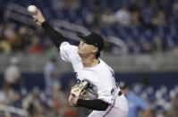 Miami Marlins starting pitcher Jordan Yamamoto throws during the first inning of the team's baseball game against the Los Angeles Dodgers, Tuesday, Aug. 13, 2019, in Miami. (AP Photo/Lynne Sladky)