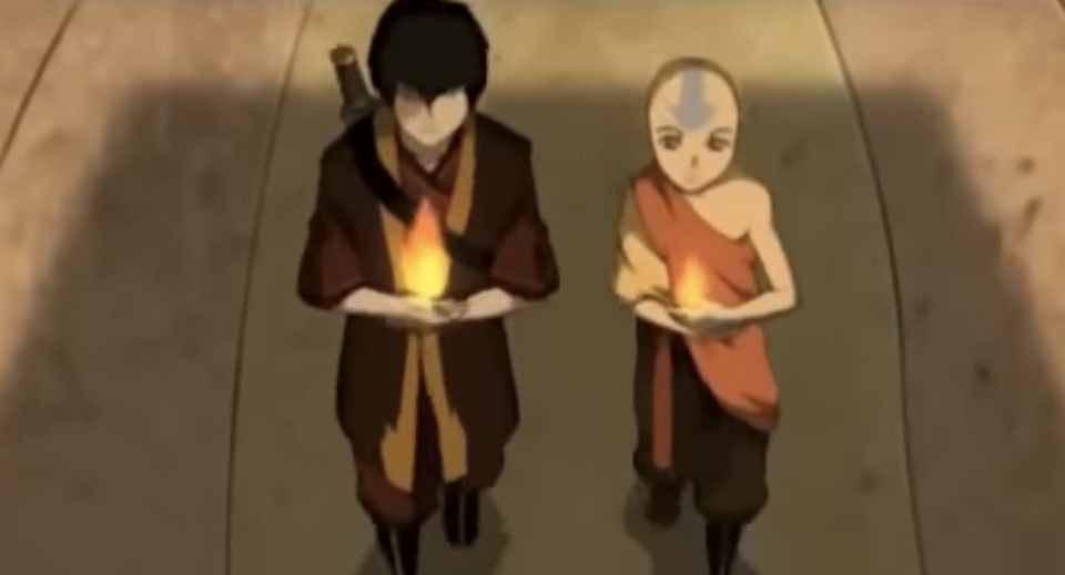 A clip from "Avatar the Last Airbender" of Aang and Zuko holding small flames