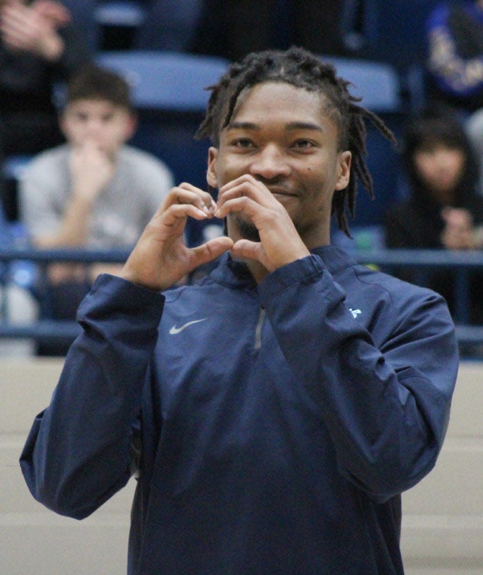 A.J. Parker expresses his appreciation to Bartlesville fans while visiting a home basketball game in 2022.