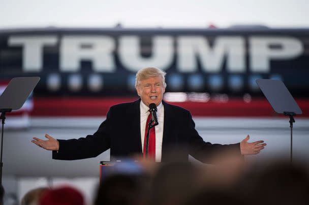 PHOTO: Republican presidential candidate Donald Trump speaks in front of his plane during a campaign event at an Air Transport Services Group Inc. airplane hanger in Wilmington, Ohio, Nov. 4, 2016. (The Washington Post via Getty Images)