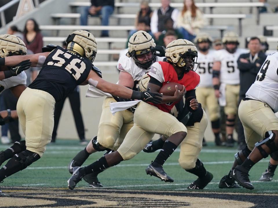 Army quarterback Dewayne Coleman (10) with the carry during a spring scrimmage at Michie Stadium at West Point on Friday, April 21, 2023.