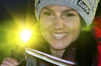 Alpine Skiing - FIS Alpine Skiing World Championships - Women's Alpine Downhill - St. Moritz, Switzerland - 12/2/17 - Stephanie Venier of Austria displays her silver medal. REUTERS/Stefano Rellandini