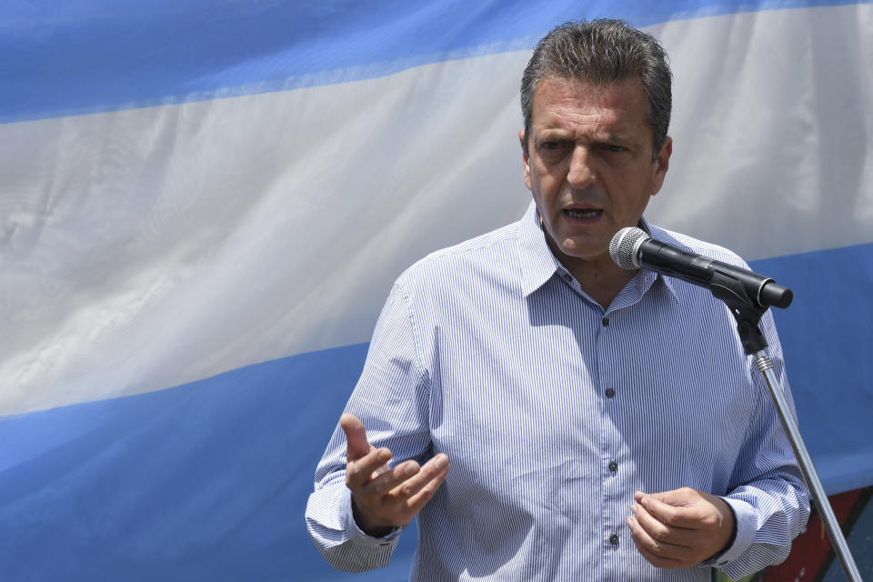 Economy Minister and presidential hopeful Sergio Massa speaks to journalists after voting in the presidential runoff election in Tigre, outskirts of Buenos Aires, Argentina, Sunday, Nov. 19, 2023. (AP Photo/Gustavo Garello)