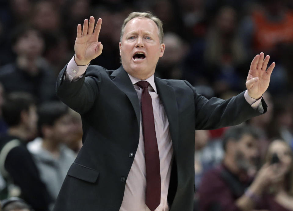 Milwaukee Bucks coach Mike Budenholzer yells instructions to players during the second half of an NBA basketball game against the Cleveland Cavaliers, Wednesday, March 20, 2019, in Cleveland. The Cavaliers won 107-102. (AP Photo/Tony Dejak)