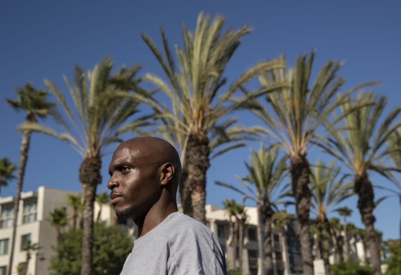 LOS ANGELES, CA -JULY 30, 2020: Roderick Thompson Sr. 35, who was released 9 months early from Avenal State Prison due to the coronavirus outbreak, is photographed outside of Union Station in downtown Los Angeles after arriving there this afternoon on an Amtrak bus. Thompson Sr. had been incarcerated at Avenal State Prison for the past 3 and 1/2 years and was released this morning. He took the train from Hanford to Bakersfield and the bus from Bakersfield to Union Station. (Mel Melcon / Los Angeles Times)