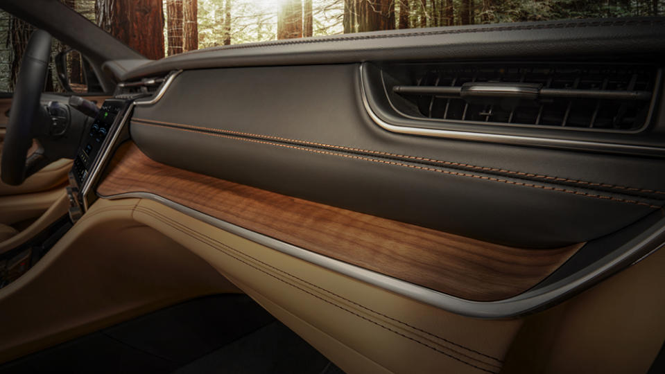 2021 Jeep® Grand Cherokee L Summit Reserve leather-wrapped instrument panel with open-pore Waxed Walnut accents and all-new slim HVAC vents