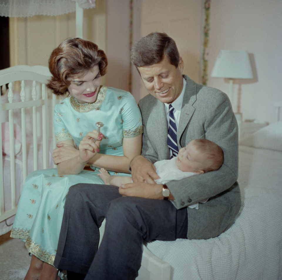 <p>Portrait of Senator John F Kennedy and Jackie Kennedy are pictured with their four-month-old daughter (and future United States Ambassador to Japan), Caroline Kennedy.</p>