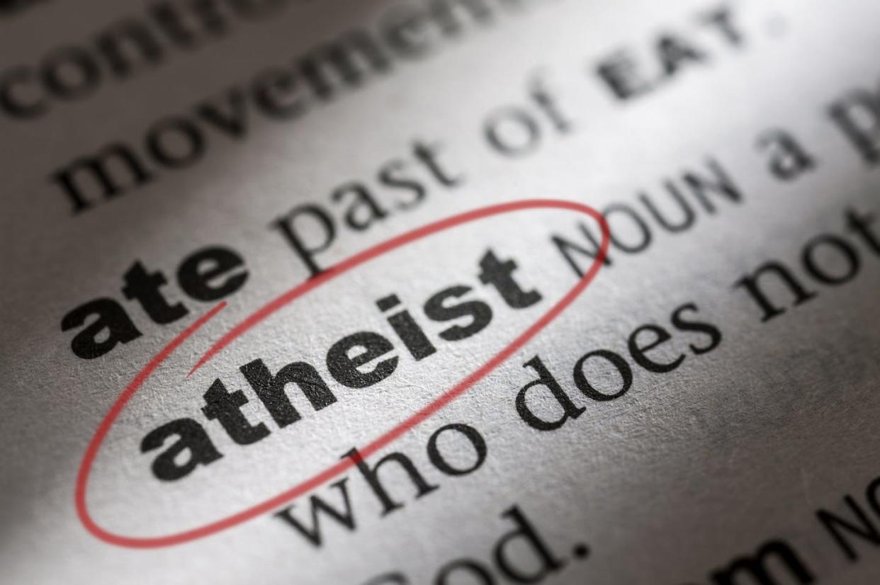 Fewer people are affiliated with religion in the United States, but that hardly means that they're all atheists. <a href="https://www.gettyimages.com/detail/photo/dictionary-entry-for-the-word-athiest-royalty-free-image/529171873?phrase=atheist&adppopup=true" rel="nofollow noopener" target="_blank" data-ylk="slk:Anthony Bradshaw/Photographer's Choice RF via Getty Images;elm:context_link;itc:0;sec:content-canvas" class="link ">Anthony Bradshaw/Photographer's Choice RF via Getty Images</a>