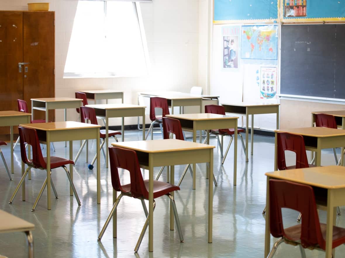 An empty classroom in Toronto in September 2020. Some Ontario schools closed to in-person learning after education workers walked off the job Friday. (Carlos Osorio/The Canadian Press - image credit)