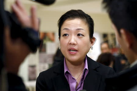 Rev. Lisa Pak, spokesperson for the family of Canadian pastor Hyeon Soo Lim who is being held in North Korea speaks to media at a joint multi-cultural prayer meeting at Light Korean Presbyterian Church in Toronto, December 20, 2015. REUTERS/Hyungwon Kang