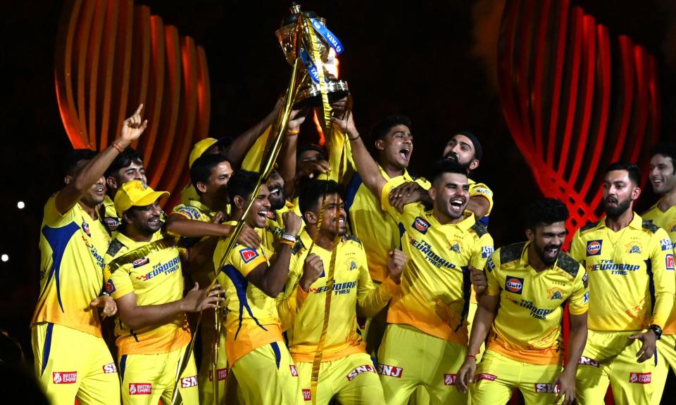 <span>Chennai Super Kings players celebrate after winning their fifth IPL title in 2023.</span><span>Photograph: Sajjad Hussain/AFP/Getty Images</span>
