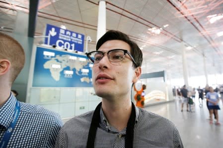 An Australian student Alek Sigley, 29, who was detained in North Korea, departs from Beijing to Japan, at the Beijing international airport