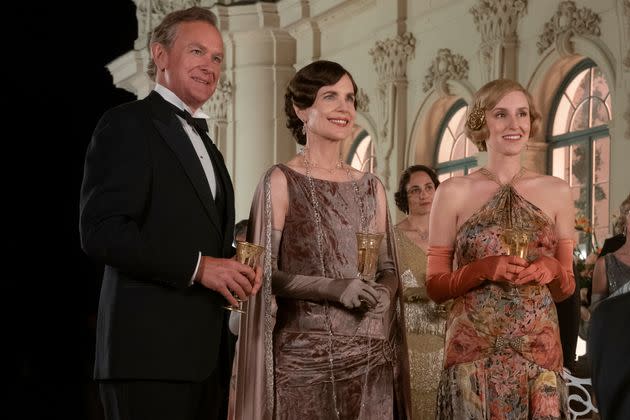 This image released by Focus Features shows Hugh Bonneville, from left, Elizabeth McGovern and Laura Carmichael in a scene from 