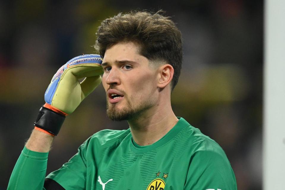 Race against time: Dortmund goalkeeper Gregor Kobel is a doubt to face Chelsea on Tuesday (Getty Images)