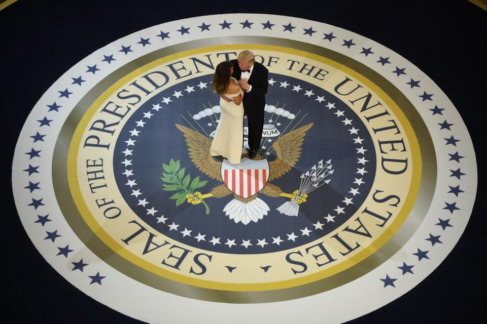 President Donald Trump and first lady Melania dance at the Armed Services ball at the National Building museum in Washington, D.C., on Jan. 20, 2017.