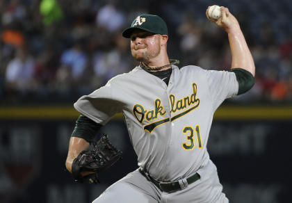 Jon Lester has been strong, but the A's have missed Yoenis Cespedes' bat. (AP)