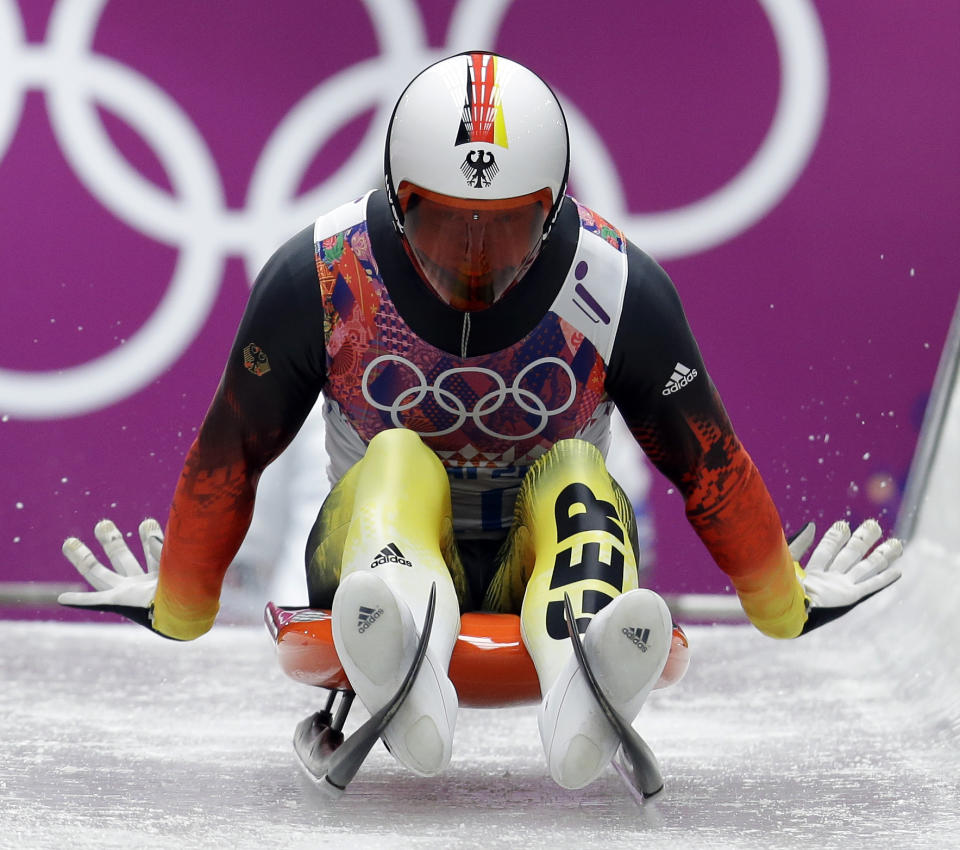 Felix Loch of Germany starts his run during the men's singles luge competition at the 2014 Winter Olympics, Saturday, Feb. 8, 2014, in Krasnaya Polyana, Russia. (AP Photo/Natacha Pisarenko)