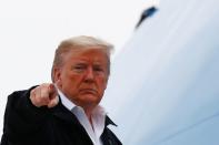 U.S. President Donald Trump boards Air Force One ahead of a trip to Tennessee, at Joint Base Andrews in Maryland