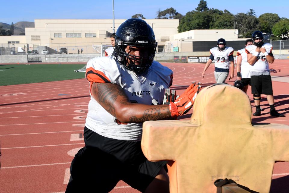 Offensive lineman Julio Rey, a Pacifica High graduate, participates in a drill during a Ventura College football team practice on Wednesday, Aug. 31, 2022. The Pirates open their season against rival Moorpark College at home on Saturday night.