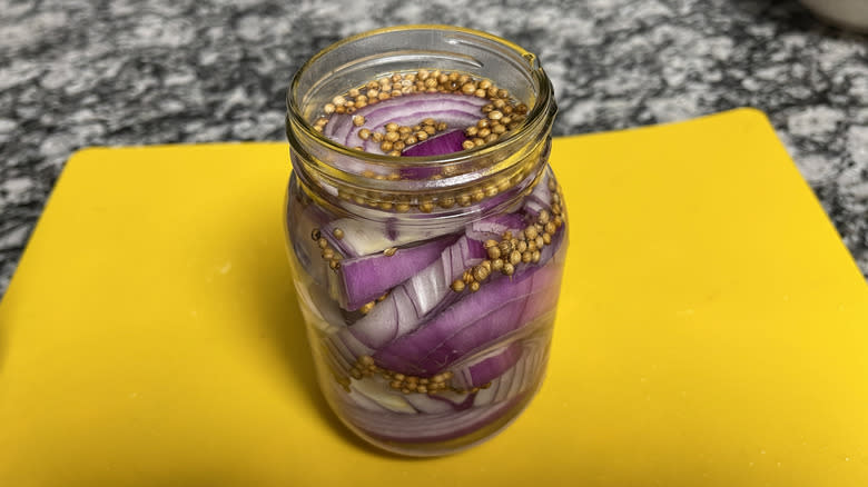 pickled red onions in jar