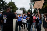 Protestors demonstrate outside the U.S. Supreme Court after U.S President Donald Trump announced U.S. Court of Appeals Judge Amy Coney Barrett as his nominee to fill the Supreme Court seat left vacant by the death of Justice Ruth Bader Ginsburg